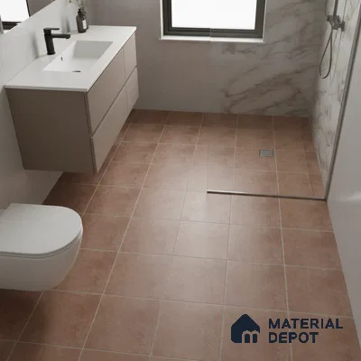 Modern bathroom with terracotta floor tiles, marble wall tiles, and floating vanity