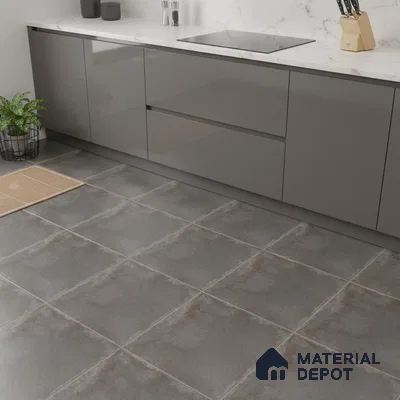 Modern kitchen with grey high gloss laminate cabinets, white marble-look quartz countertop, and matte grey stone floor tiles