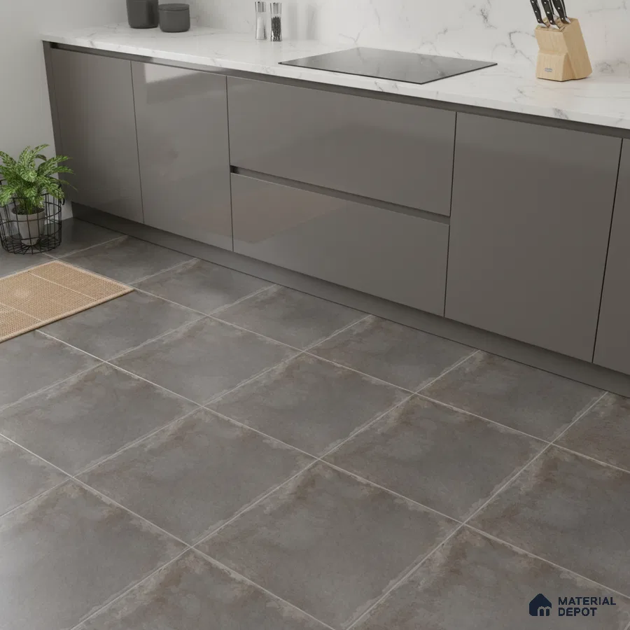 Modern kitchen with grey high gloss laminate cabinets, white marble-look quartz countertop, and matte grey stone floor tiles