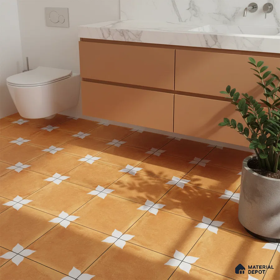 Modern bathroom with terracotta floral patterned floor tiles and matte peach vanity
