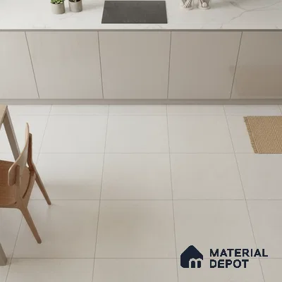 Minimalist kitchen with glossy beige laminate cabinets, white marble-look countertop, and large format light beige floor tiles