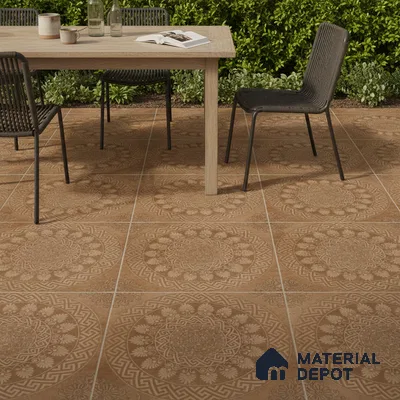 Mediterranean outdoor space with terracotta patterned floor tiles and natural wood dining table