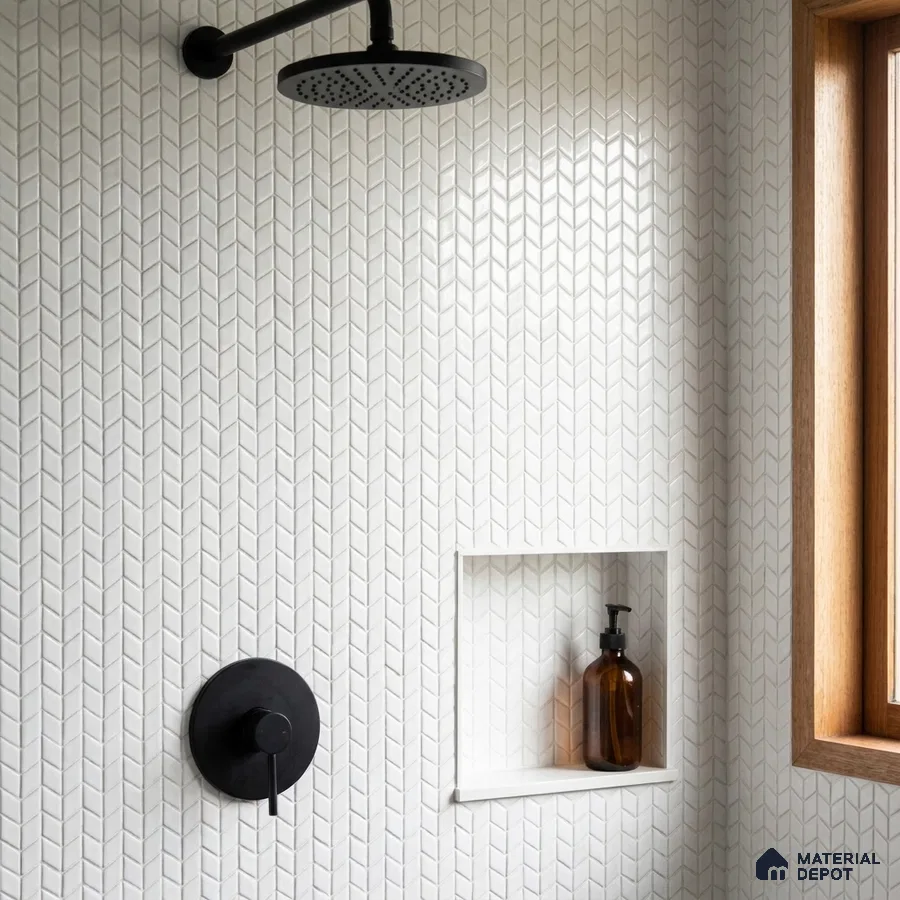 Minimalist Shower Area with White Chevron Mosaic Tile and Matte Black Fixtures