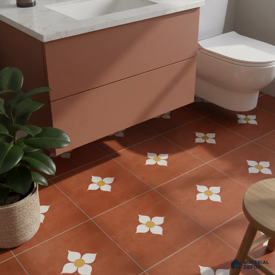 Modern bathroom with terracotta floral patterned floor tiles and blush pink laminate vanity