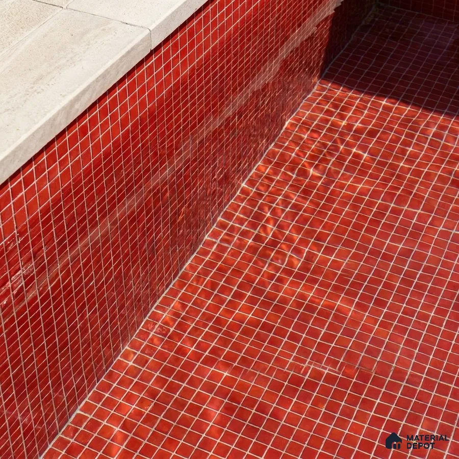 Mediterranean Swimming Pool with Red Glass Mosaic Tile and Stone Coping