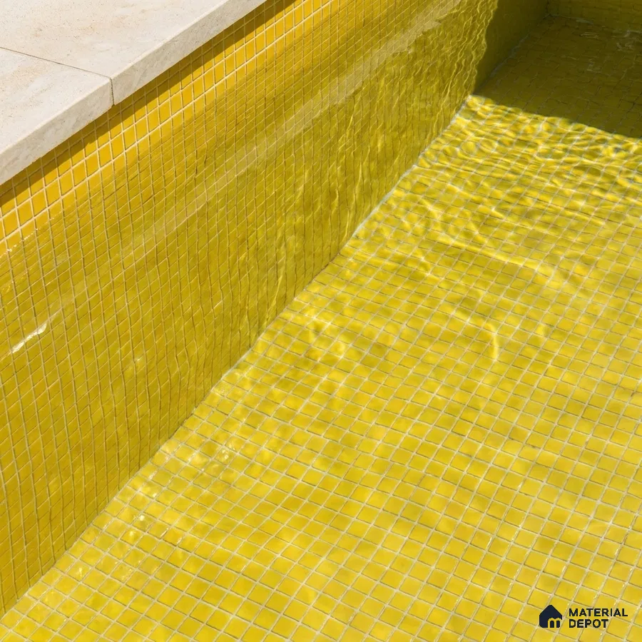 Mediterranean Swimming Pool with Yellow Glass Mosaic Tile and Stone Coping