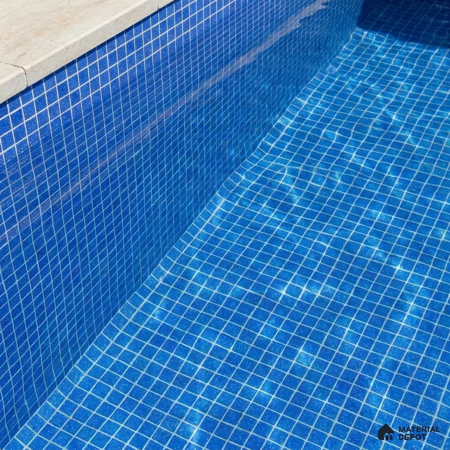 Mediterranean Swimming Pool with Cobalt Blue Glass Mosaic Tile and Stone Coping