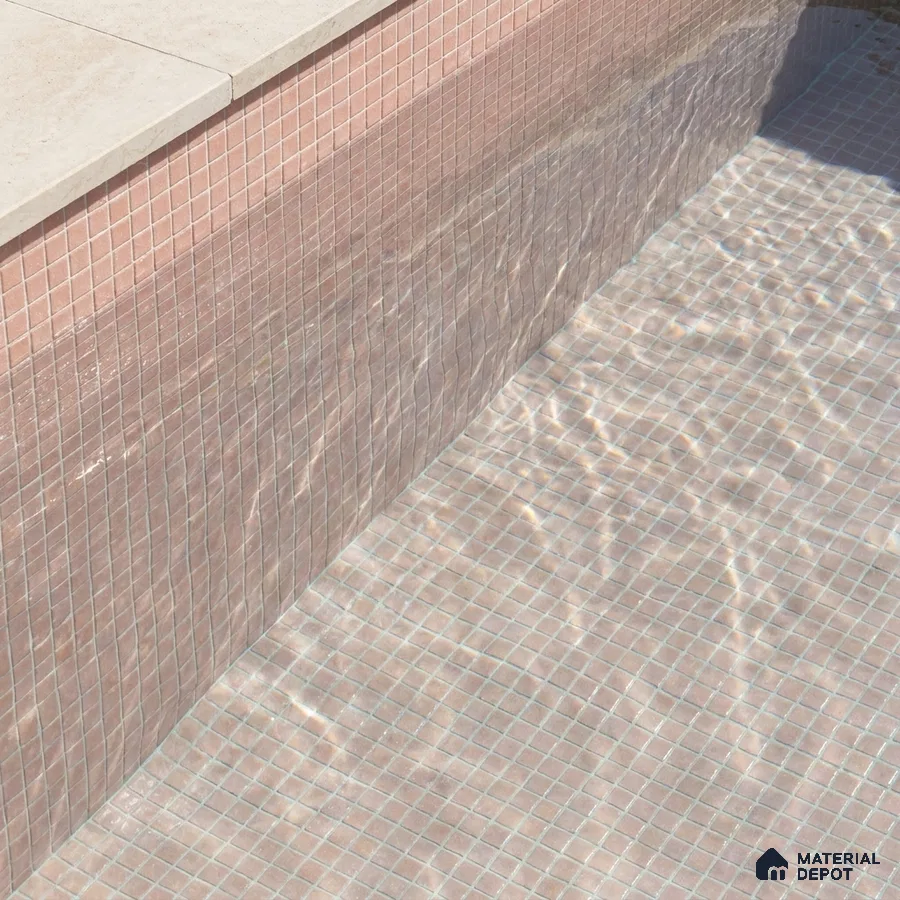 Mediterranean Swimming Pool with Blush Pink Glass Mosaic Tile and Stone Coping