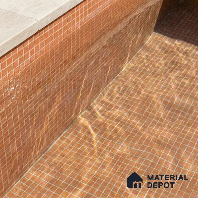 Mediterranean Swimming Pool with Terracotta Glass Mosaic Tile and Stone Coping