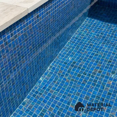 Modern Swimming Pool with Cobalt Blue Glass Mosaic Tile and Stone Coping