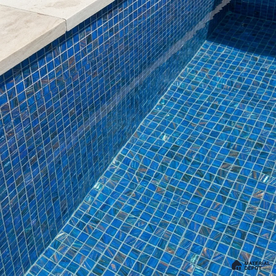 Modern Swimming Pool with Cobalt Blue Glass Mosaic Tile and Stone Coping