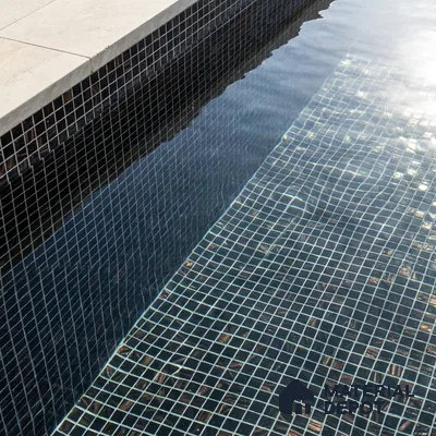 Modern Swimming Pool with Dark Bronze Glass Mosaic Tile and Stone Coping