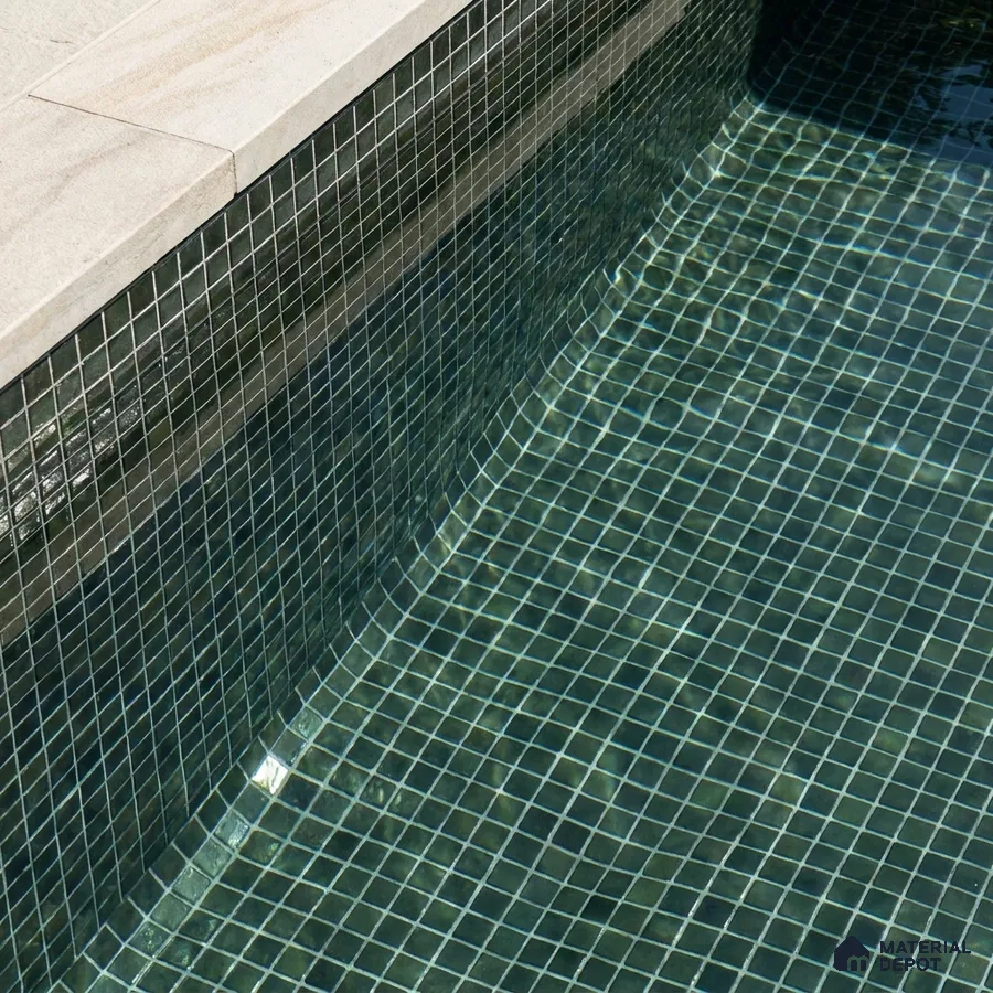 Modern Swimming Pool with Deep Green Glass Mosaic Tile and Stone Coping