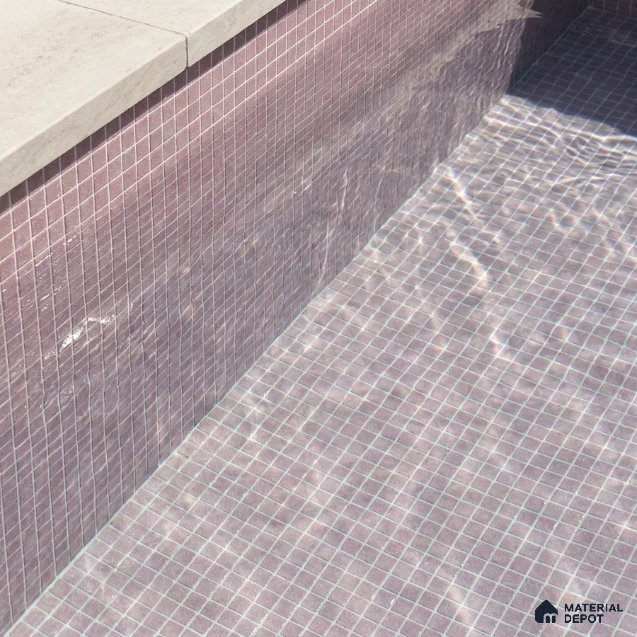 Modern Swimming Pool with Dusty Plum Glass Mosaic Tile and Stone Coping