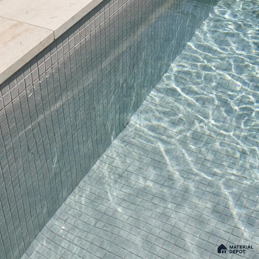 Modern Swimming Pool with Sage Grey Glass Mosaic Tile and Stone Coping