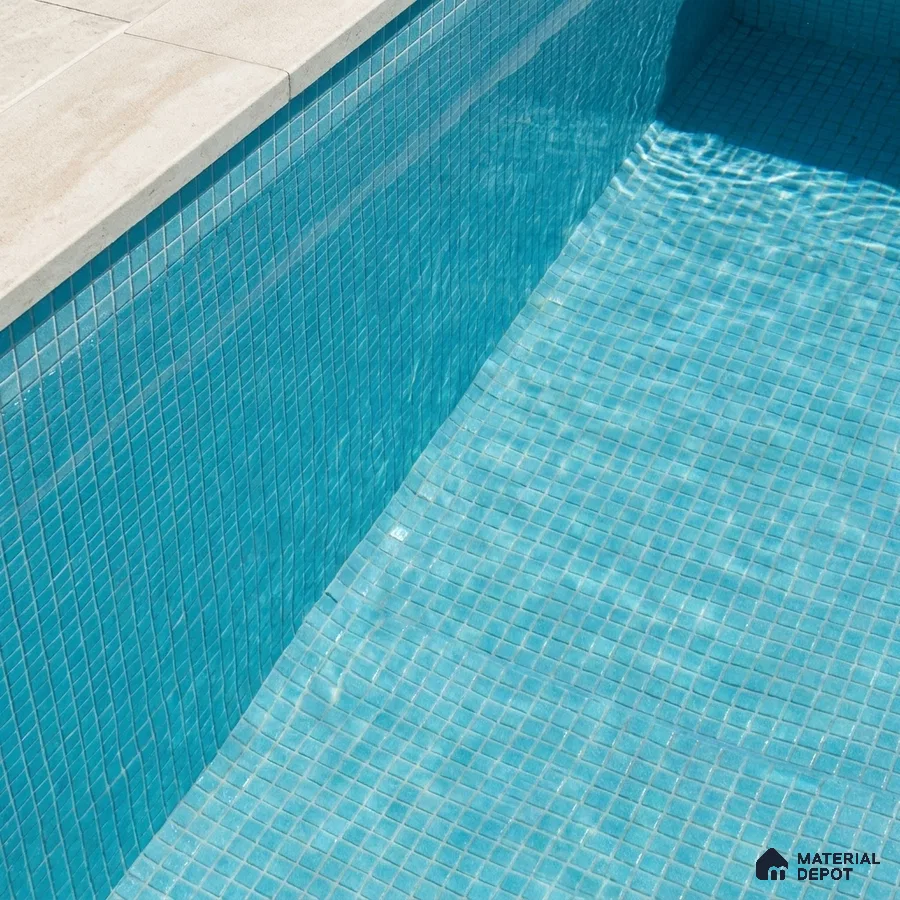 Modern Swimming Pool with Turquoise Glass Mosaic Tile and Stone Coping