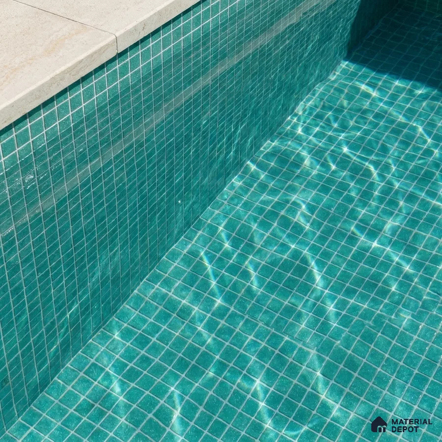 Modern Swimming Pool with Teal Green Glass Mosaic Tile and Stone Coping