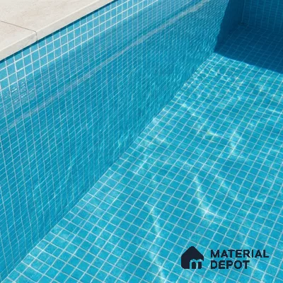 Modern Swimming Pool with Bright Blue Glass Mosaic Tile and Stone Coping