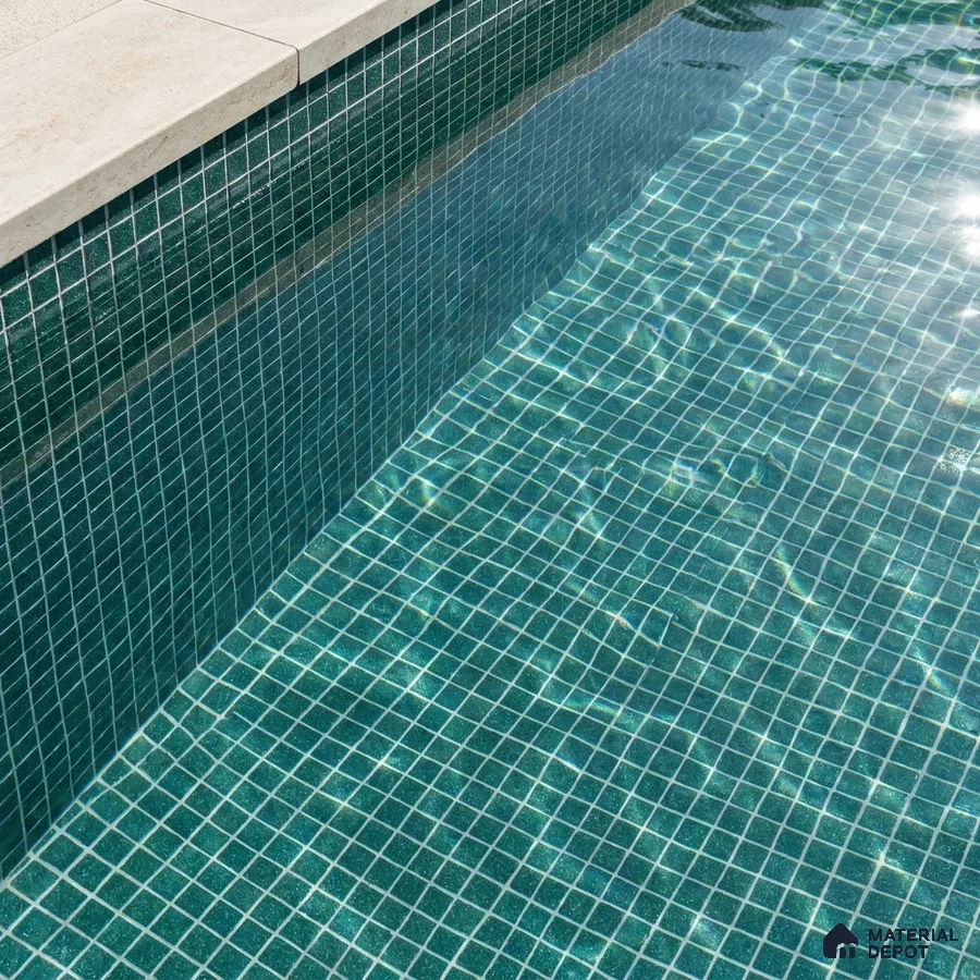 Modern Swimming Pool with Teal Green Glass Mosaic Tile and Stone Coping