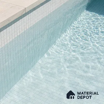 Modern Swimming Pool with Frosty White Glass Mosaic Tile and Stone Coping