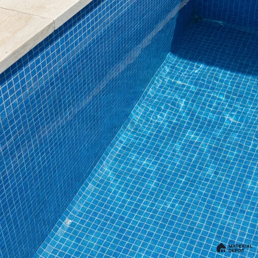 Modern Swimming Pool with Cobalt Blue Glass Mosaic Tile and Stone Coping