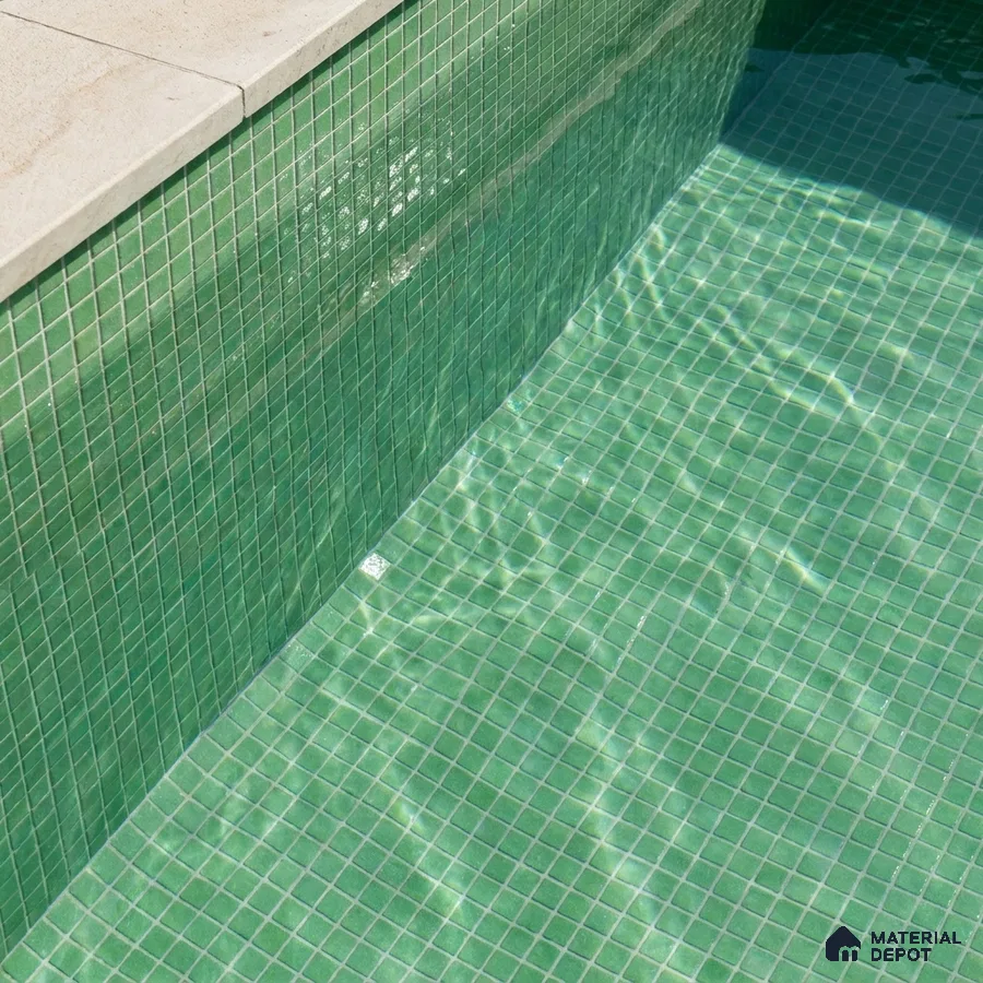 Modern Swimming Pool with Green Glass Mosaic Tile and Stone Coping