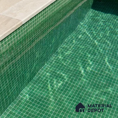 Modern Swimming Pool with Emerald Green Glass Mosaic Tile and Stone Coping