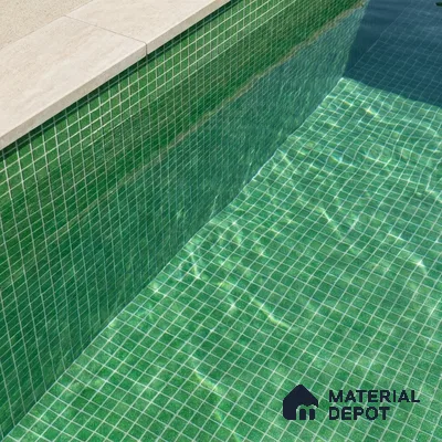Modern Swimming Pool with Green Glass Mosaic Tile and Stone Coping