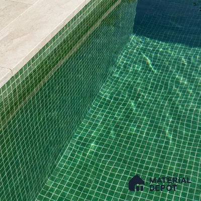 Modern Swimming Pool with Green Glass Mosaic Tile and Stone Coping