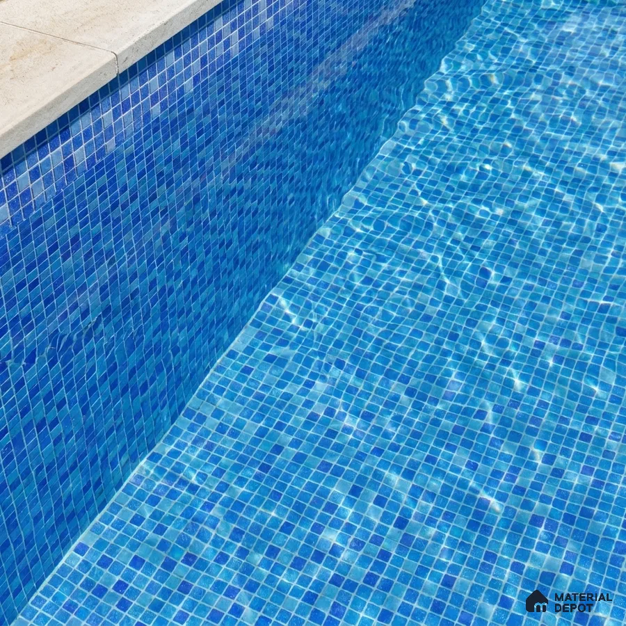 Modern Swimming Pool with Blended Blue Glass Mosaic Tile and Stone Coping