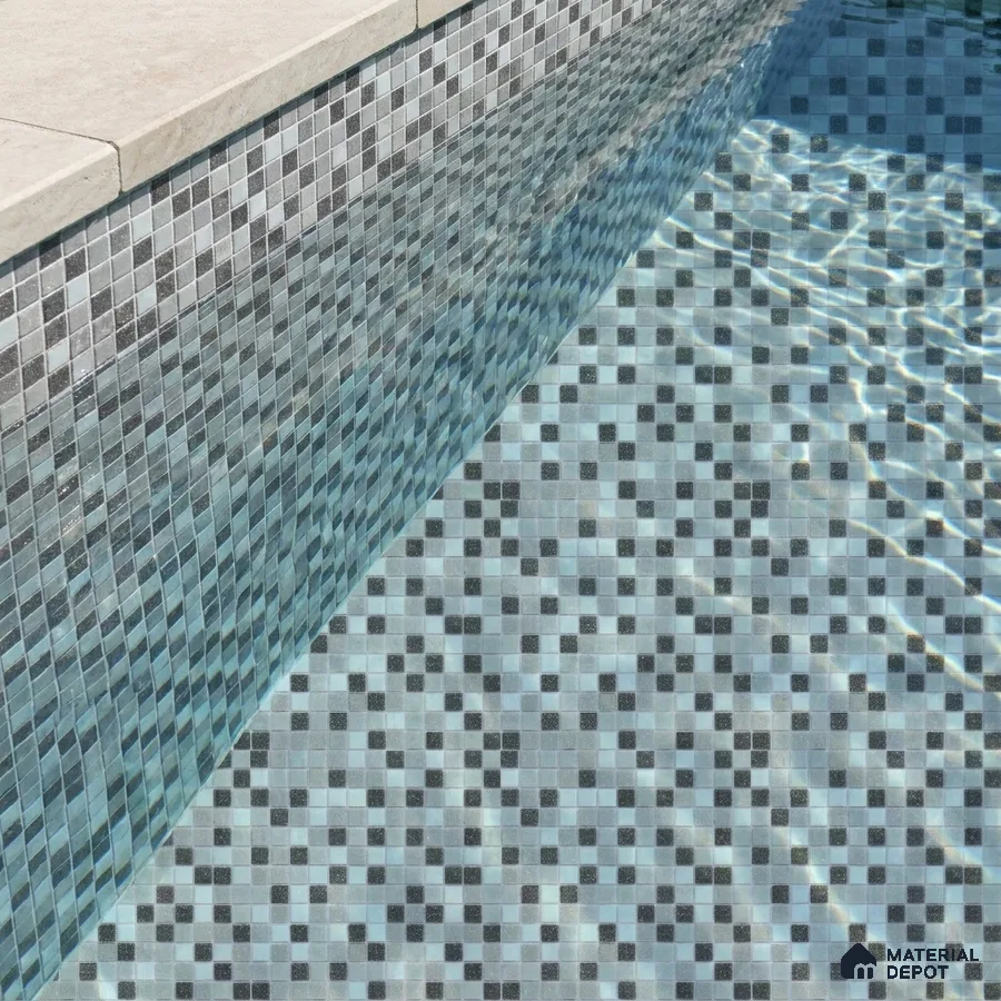 Modern Swimming Pool with Grey Glass Mosaic Tile and Cream Stone Coping