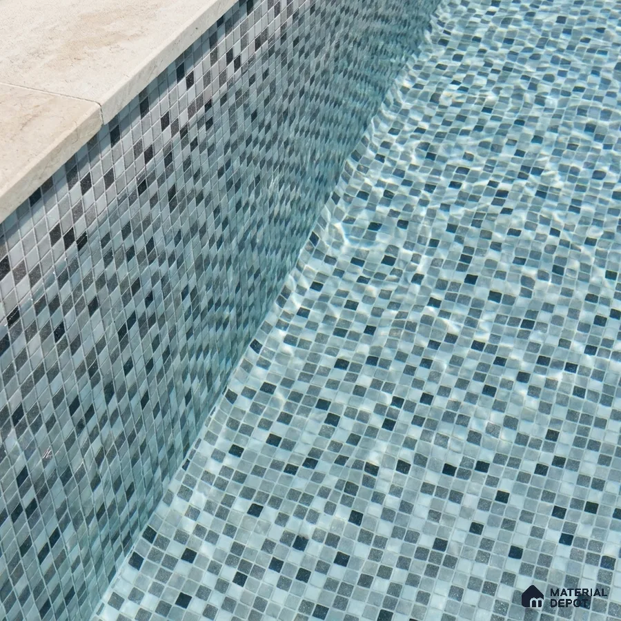 Modern Swimming Pool with Grey Glass Mosaic Tile and Cream Stone Coping
