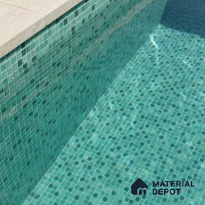 Modern Swimming Pool with Teal Green Glass Mosaic Tile and Stone Coping