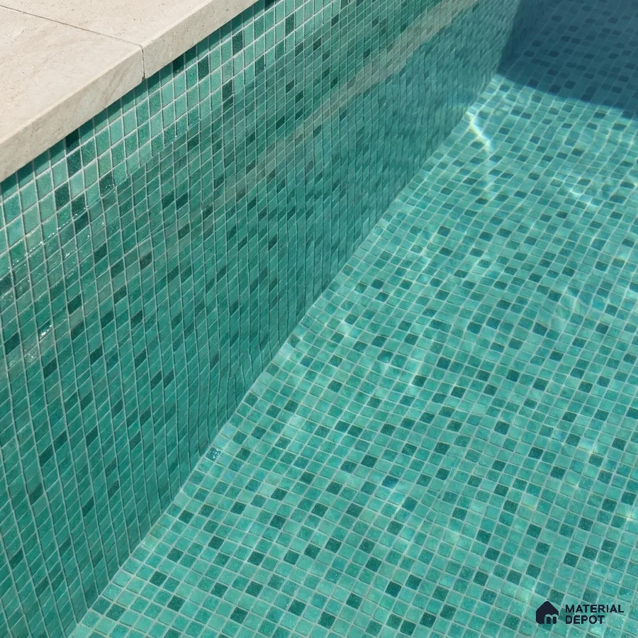 Modern Swimming Pool with Teal Green Glass Mosaic Tile and Stone Coping
