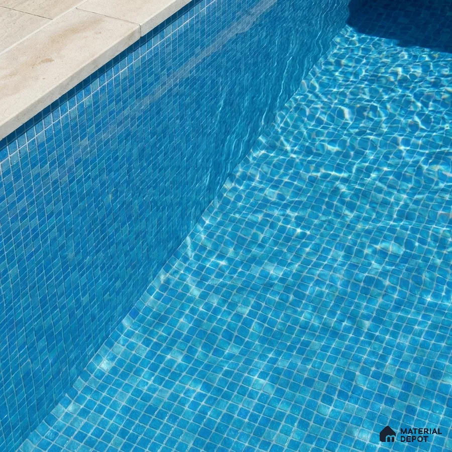 Modern Swimming Pool with Aqua Blue Glass Mosaic Tile and Stone Coping