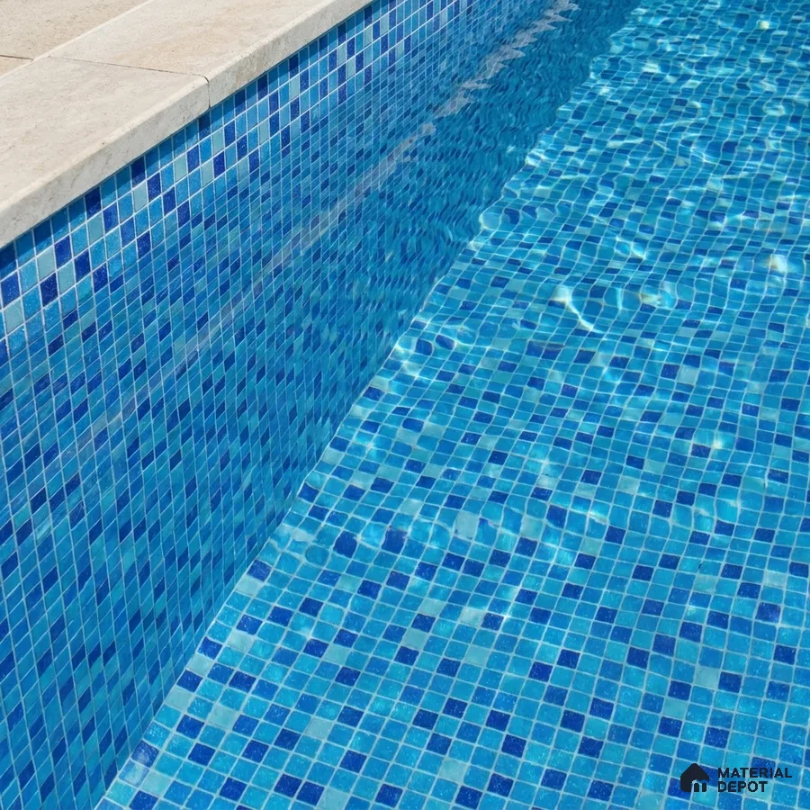 Modern Swimming Pool with Cobalt Blue Glass Mosaic Tile and Stone Coping