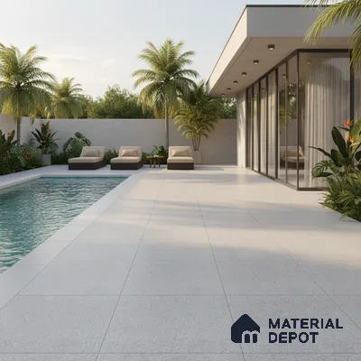 Modern outdoor poolside with large format light grey stone tiles and glass facade
