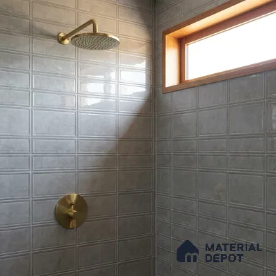 Modern Bathroom with Grey Glossy Framed Square Tile and Brass Fixtures