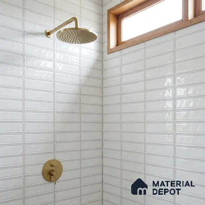 Modern Bathroom with White Glossy Framed Rectangle Tile and Brass Fixtures