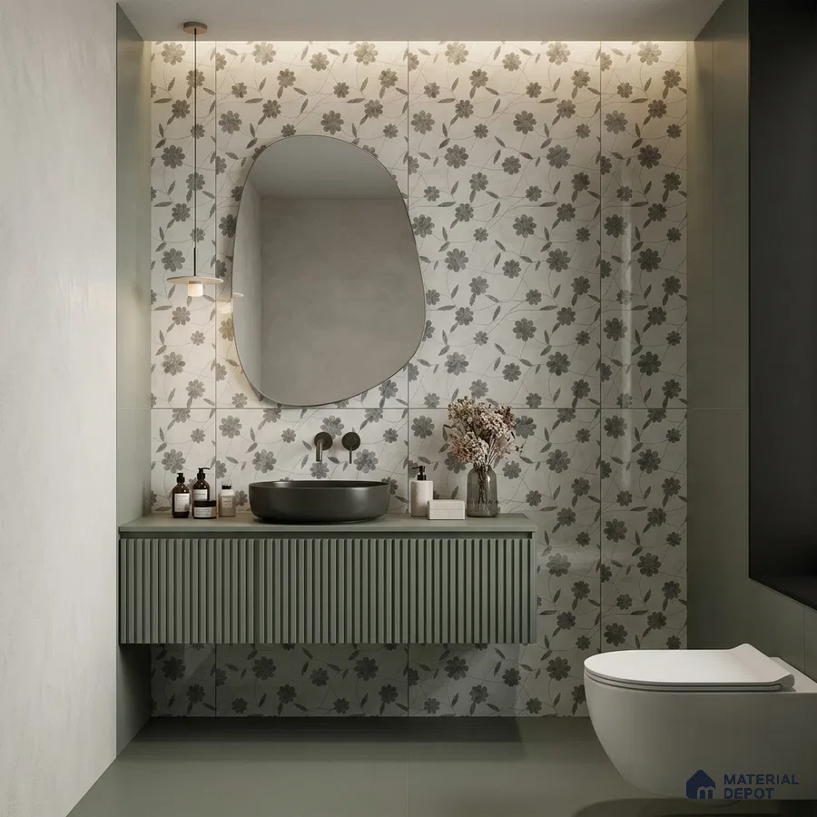 Modern bathroom with sage green fluted vanity, floral patterned wall tiles, and matte fixtures