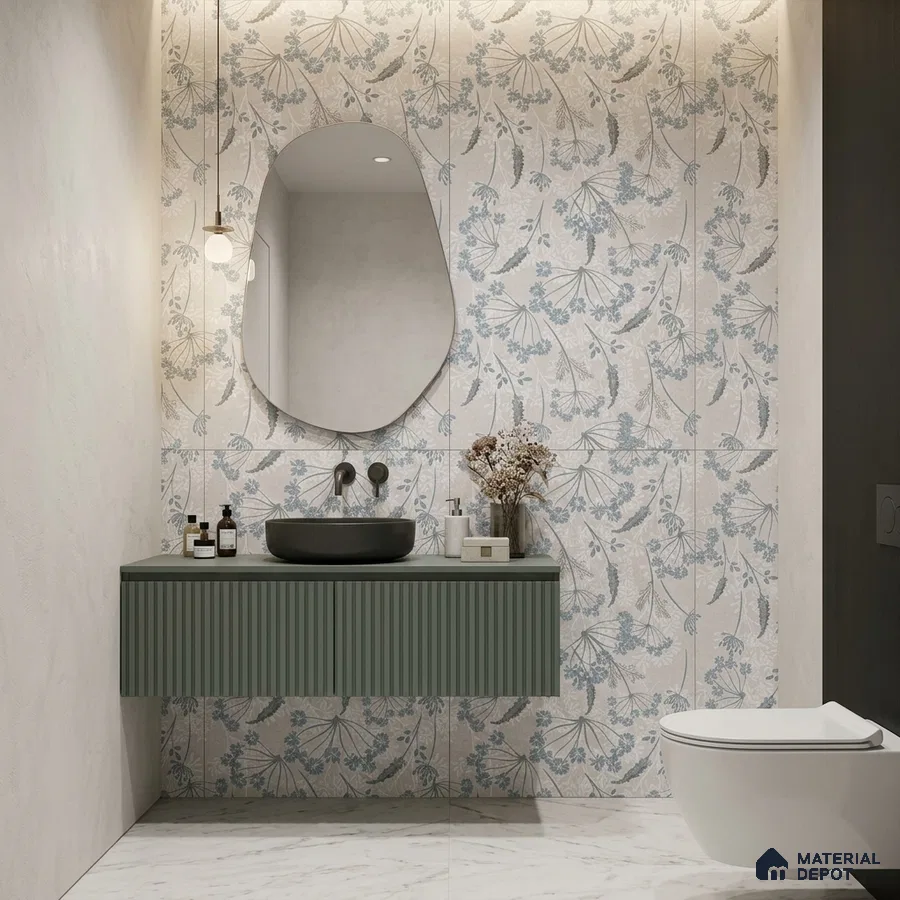 Modern bathroom with floral patterned wall tiles, sage green fluted vanity, and marble floor tiles