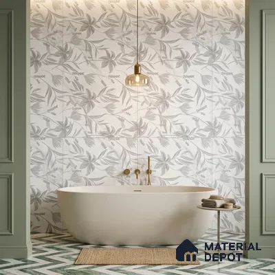 Modern bathroom with floral patterned wall tiles and green chevron floor tiles