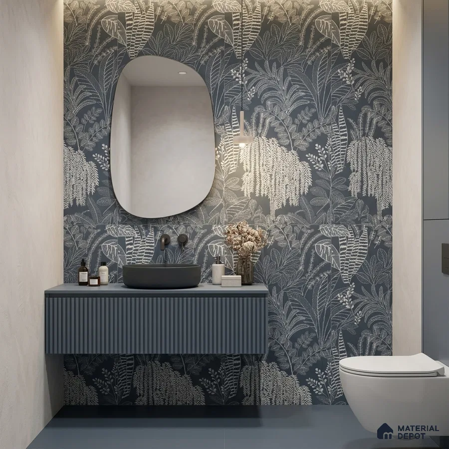 Modern bathroom with blue fluted vanity, botanical patterned tile accent wall, and matte grey basin