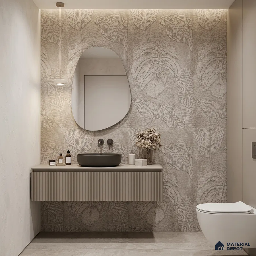 Minimalist bathroom with beige fluted vanity, leaf-patterned textured wall tiles, and matte grey basin