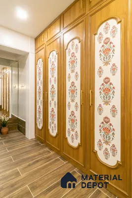 Traditional wardrobe with floral patterned panels and oak wood laminate in walk-in closet | Material Depot