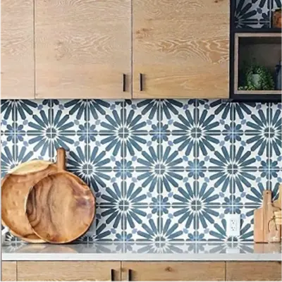 Moroccan-style tiles with intricate, vibrant patterns, adding exotic flair to interior spaces.