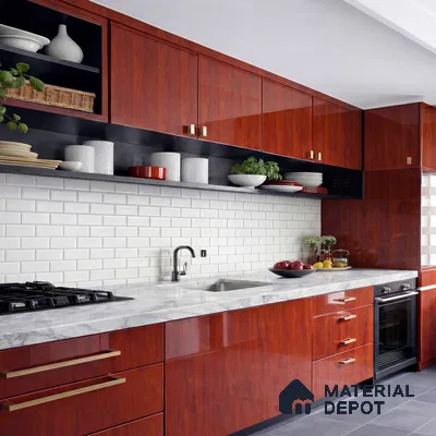 Modern kitchen with high gloss cherry wood laminate, white marble countertop, and white subway tile backsplash