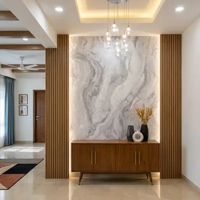 Modern foyer with grey marble accent wall, walnut wood louvers, and beige marble floor tile