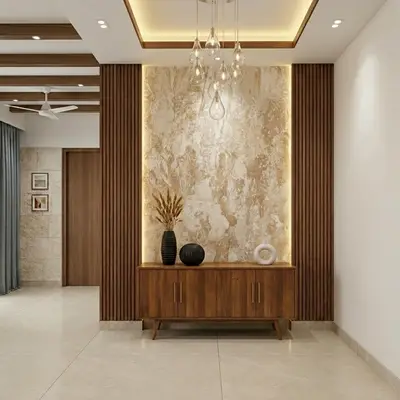 Modern foyer with walnut wood laminate console, beige marble accent wall, and wooden fluted panels