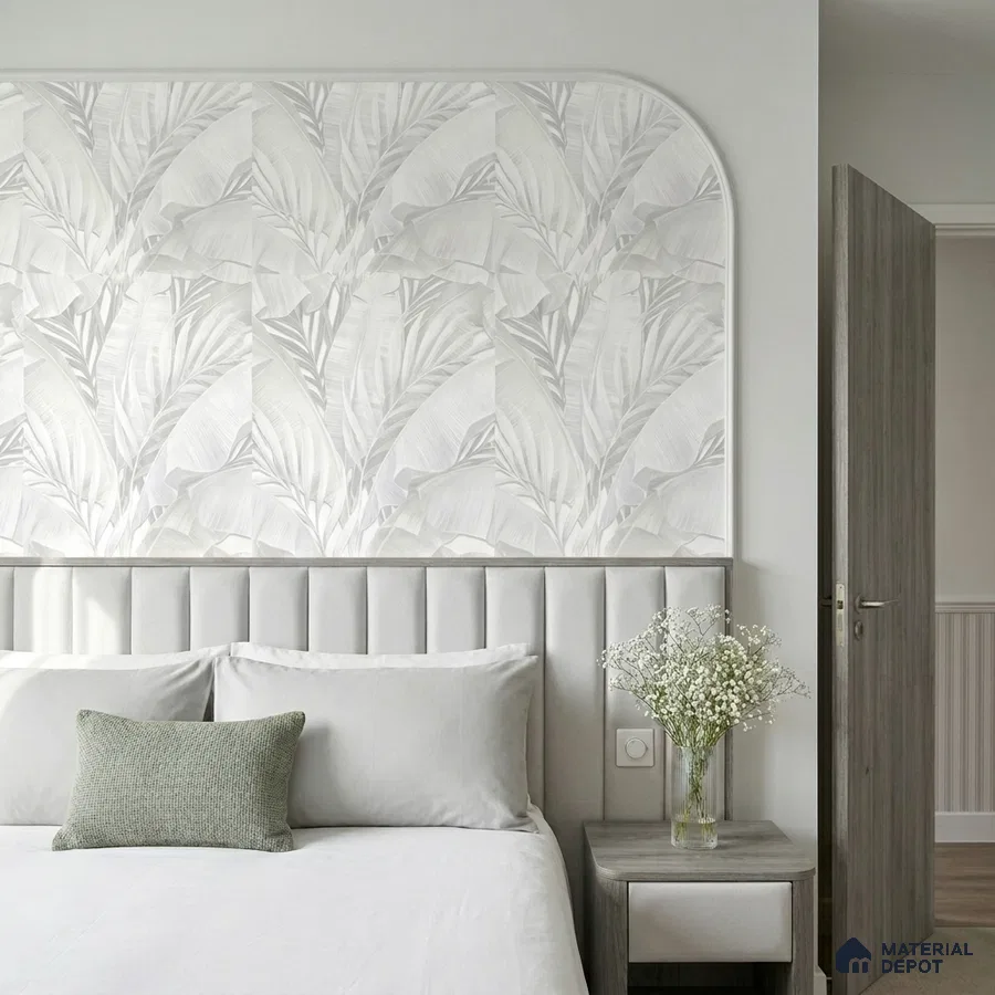 Minimalist bedroom with grey suede upholstered headboard and tropical patterned wallpaper accent wall